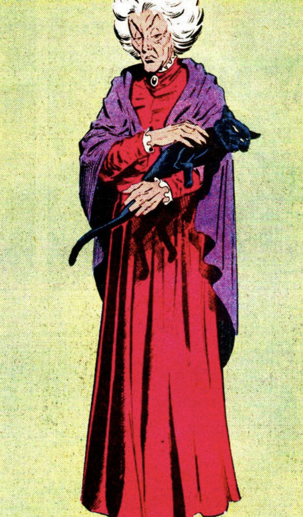 Classic Agatha Harkness in red dress and purple shawl holding her black cat, comic art