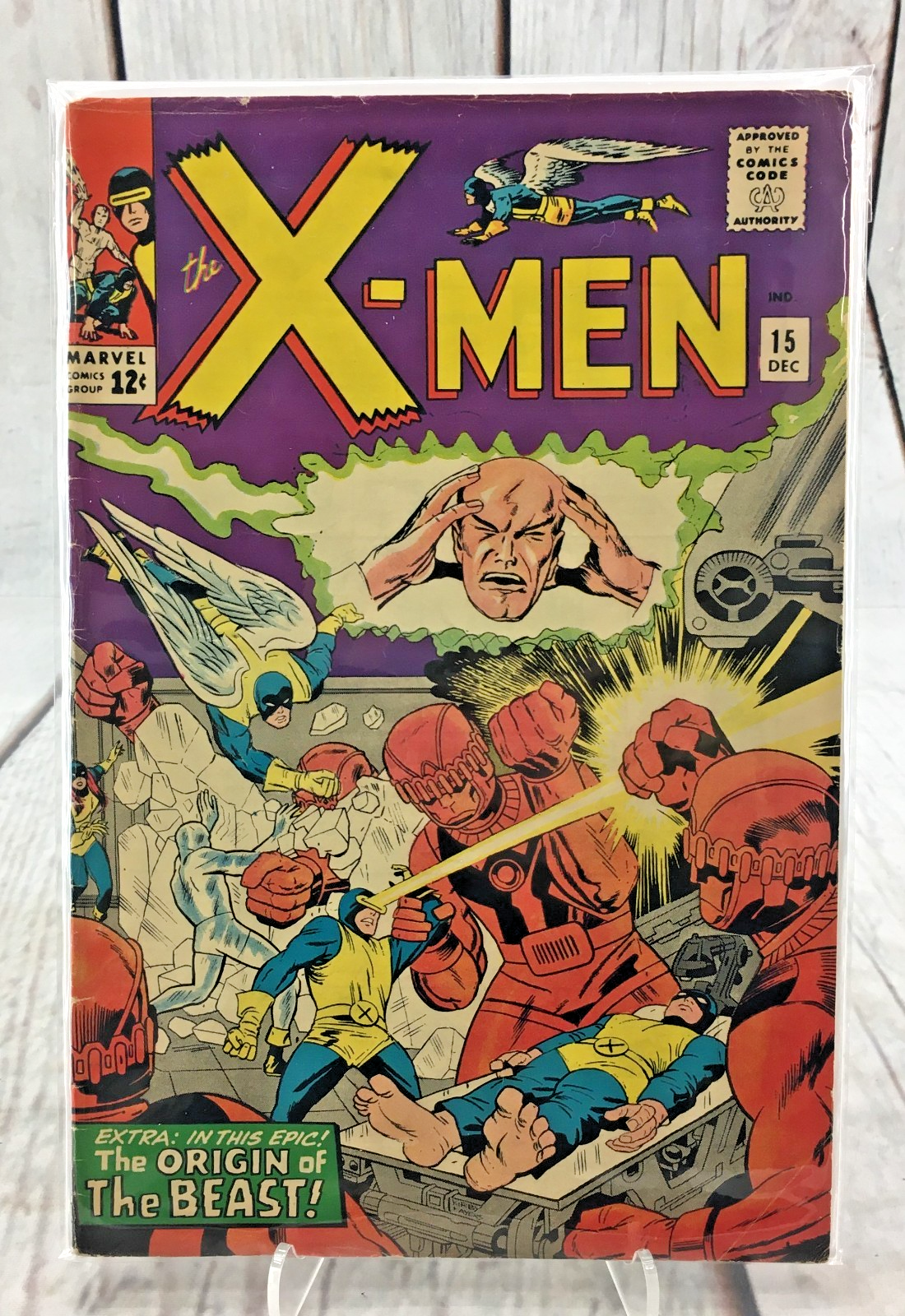Cover of X-Men #15, the Origin of the Beast, with Beast on a slab showing his huge bare feet