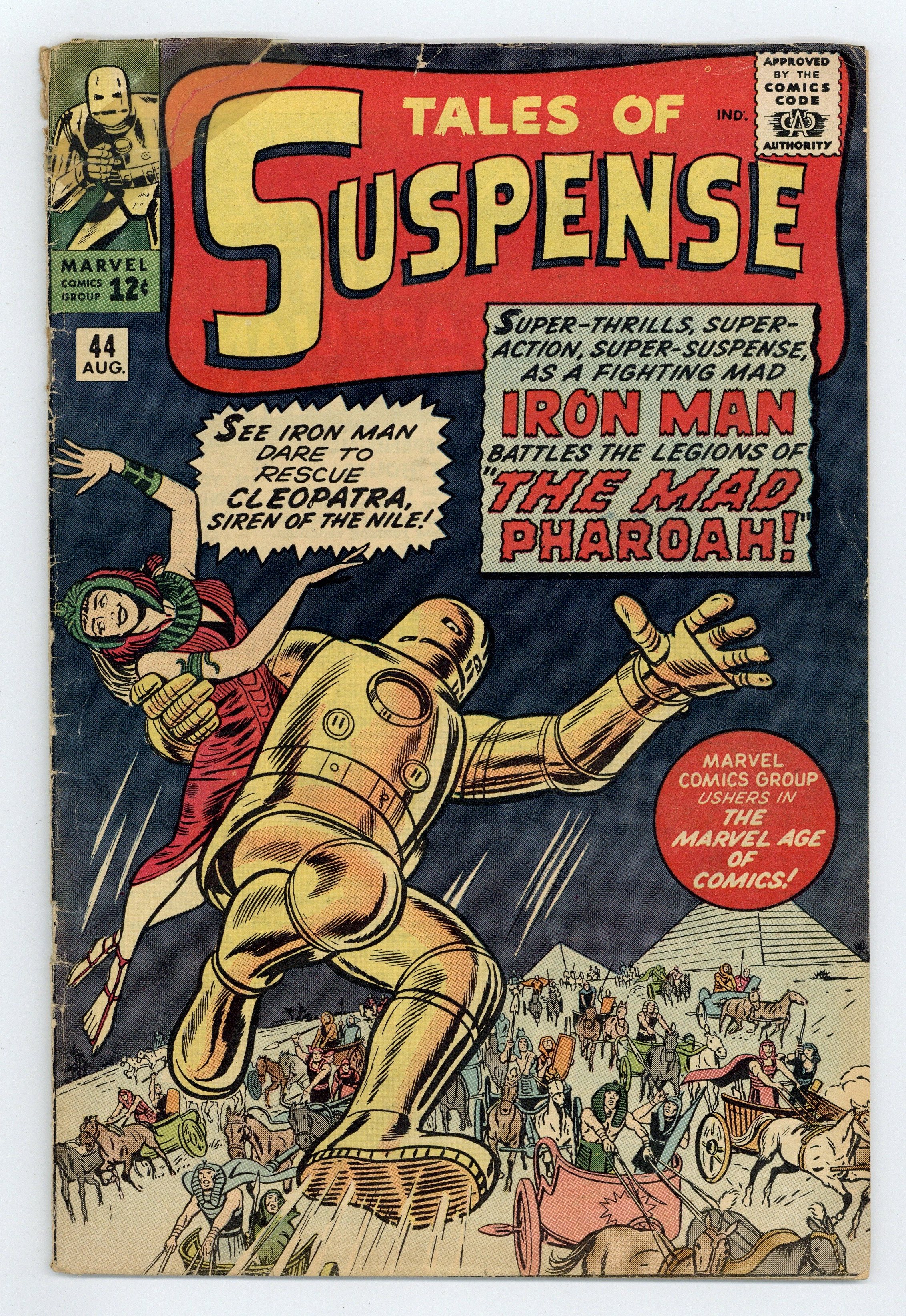 The gold Iron Man armor carrying Cleopatra on the Tales of Suspense #44 cover