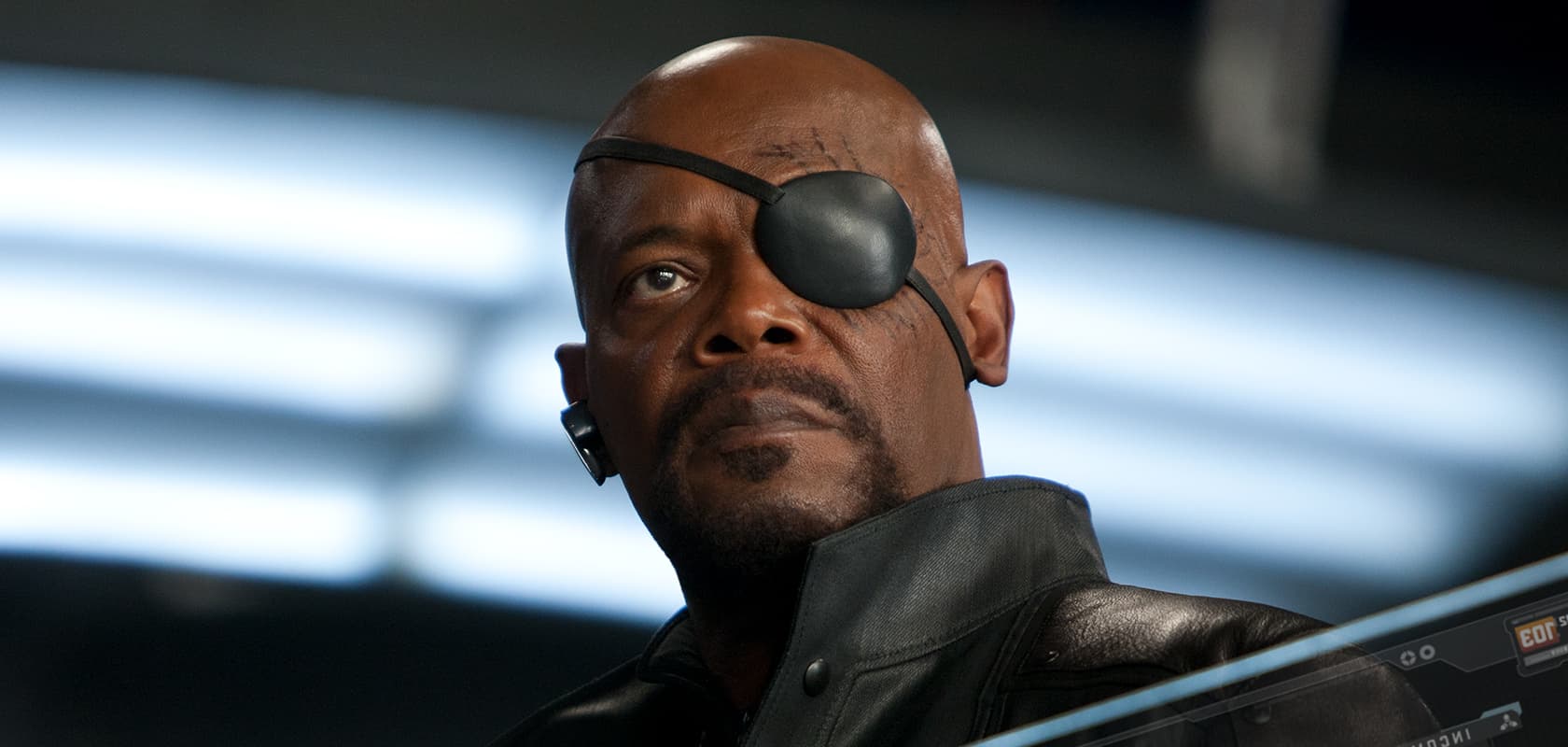 Nick Fury with eyepatch and earpiece