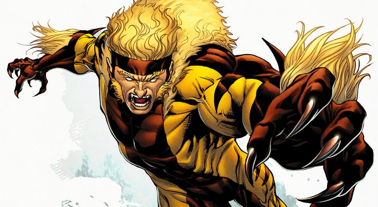 Classic Sabretooth comic art: Victor Creed lunging forward with claws out, blond mane, brown-and-yellow costume