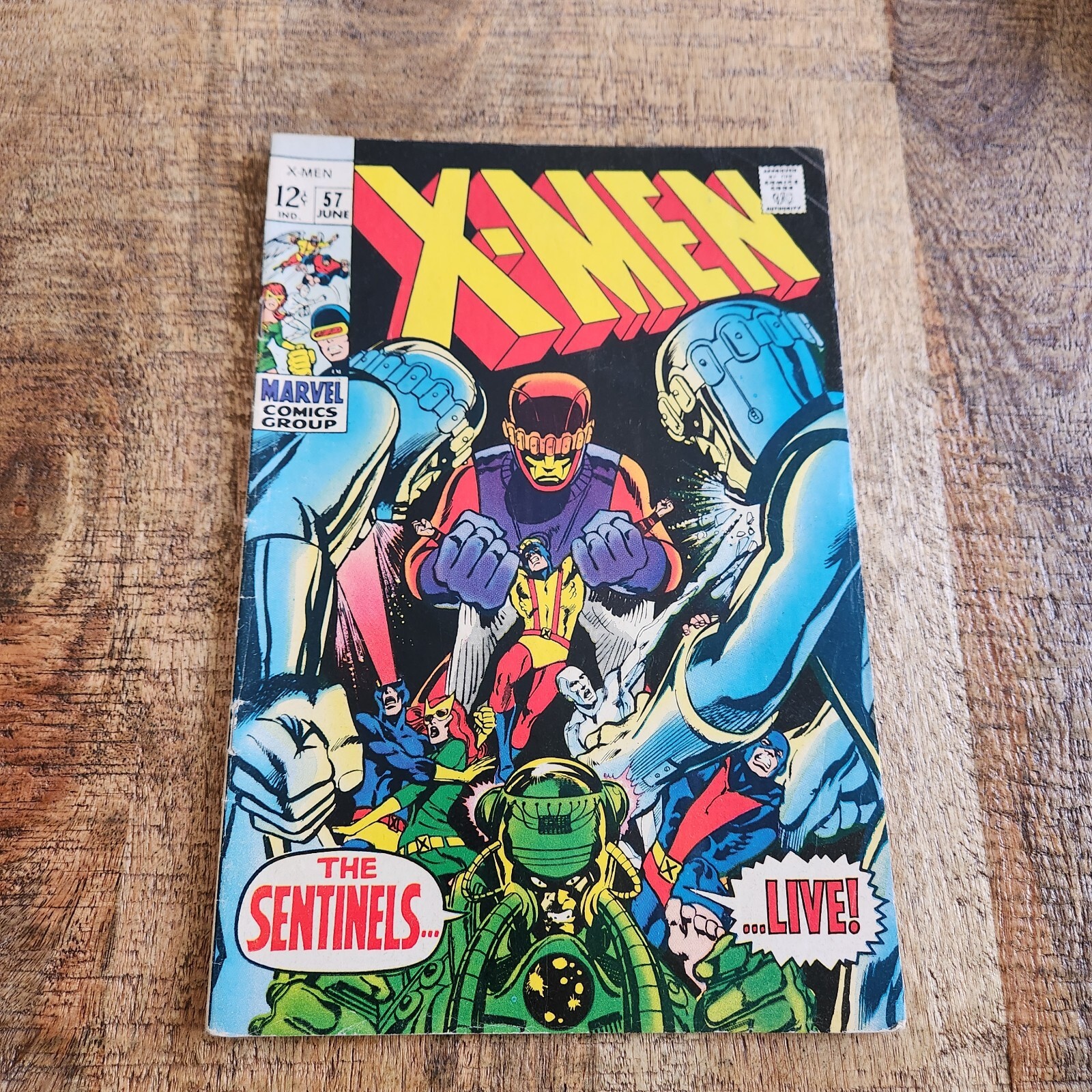 X-Men number 57 cover showing giant Sentinels menacing the X-Men