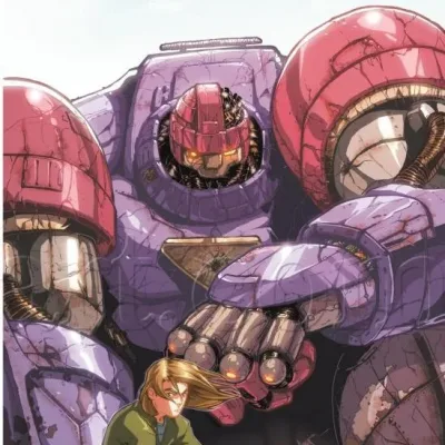 Giant purple and pink Sentinels looming over a small human figure