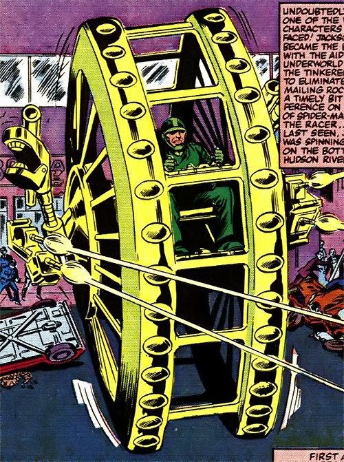 Jackson Weele driving the giant yellow Big Wheel monowheel through a street