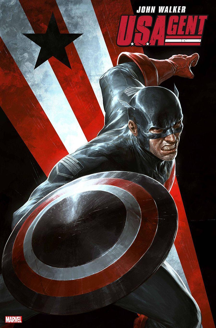John Walker as U.S. Agent in a black costume raising his black, red and silver shield